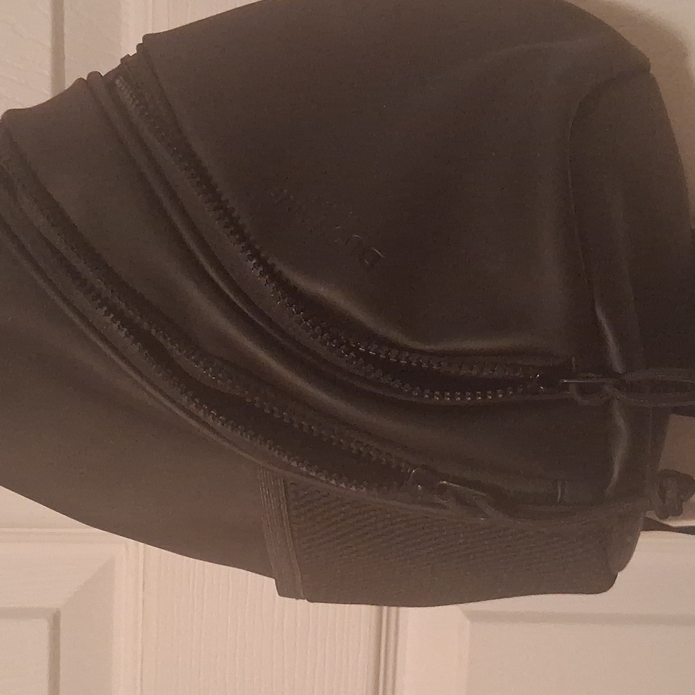 Duchamp Sleek Black Sling Back W 3 Separate Zipper Pouches